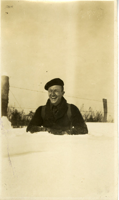 Another Apperson protégé laughing chest-deep in snow on a fact-finding mission.