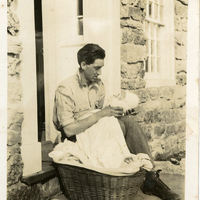 Paul Schaefer with his infant daughter Mary outside their Schenectady home, c. 1935.