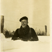 Another Apperson protégé laughing chest-deep in snow on a fact-finding mission.