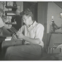 Self portrait of Paul Schaefer taken in his den in the attic of 2637 Augustine Ave. Schenectady, NY in 1925. Next to him is a taxidermied owl that he took in 1923 and had mounted by Joseph Sahatler of Long Lake, NY.